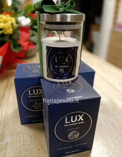 Candela profumata in elegante contenitore in vetro con scatola blu h.cm.13x9